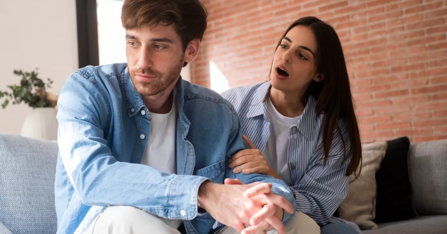 Individual contemplating their choice of partners and emotional availability in relationships