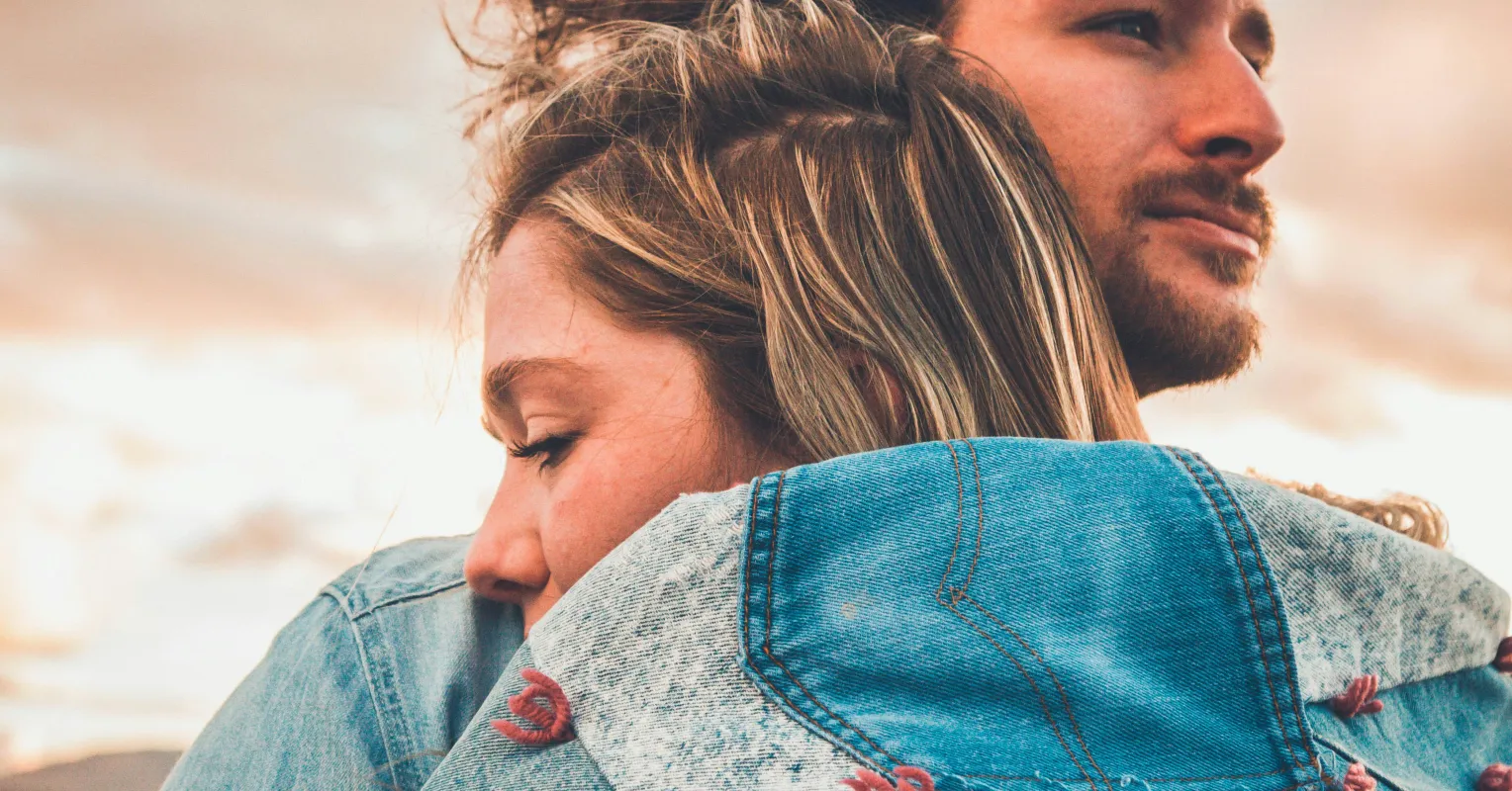 A person hesitating with anxious thoughts before initiating conversation with their partner