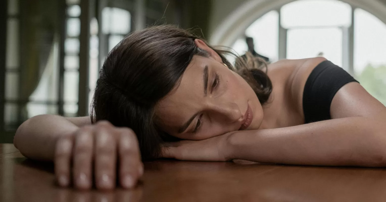 Person experiencing anxiety, reflecting on feelings after a breakup and its emotional fallout