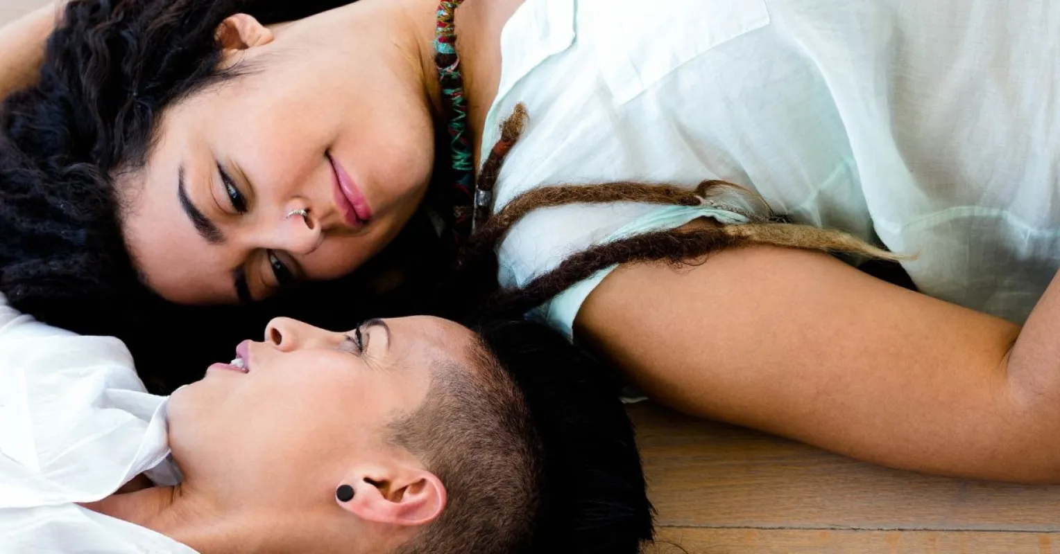 Couple looking uncertain after a disagreement, reflecting on relationship insecurity signals.