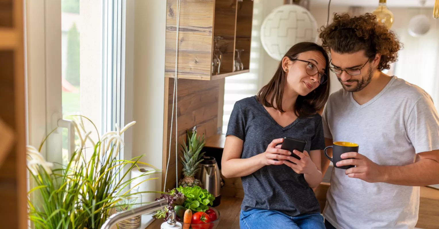 Person contemplating feelings of insecurity due to delayed text replies in a relationship