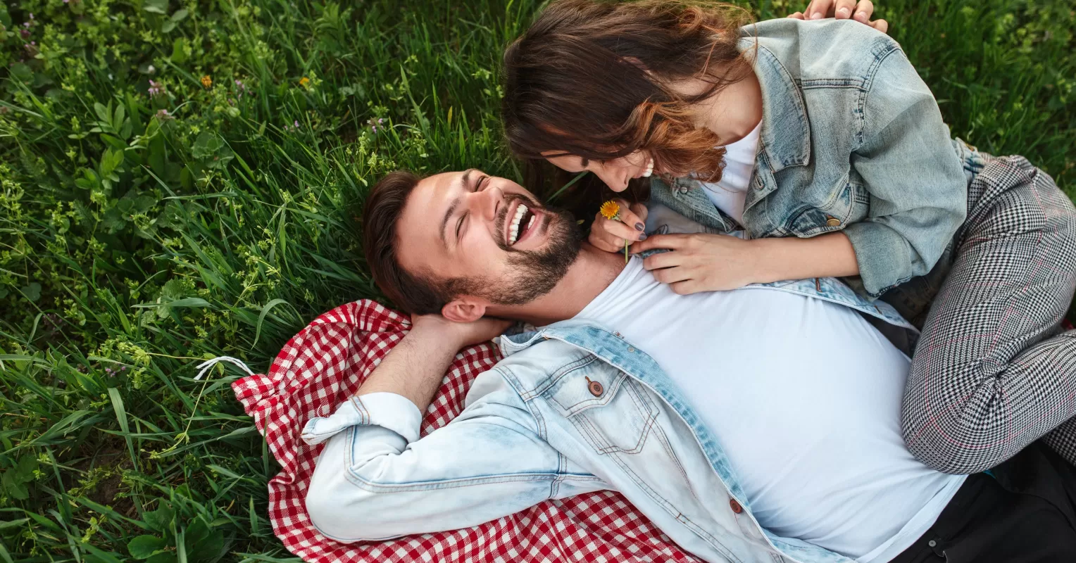 Couple enjoying a peaceful moment in nature, fostering feelings of relationship security
