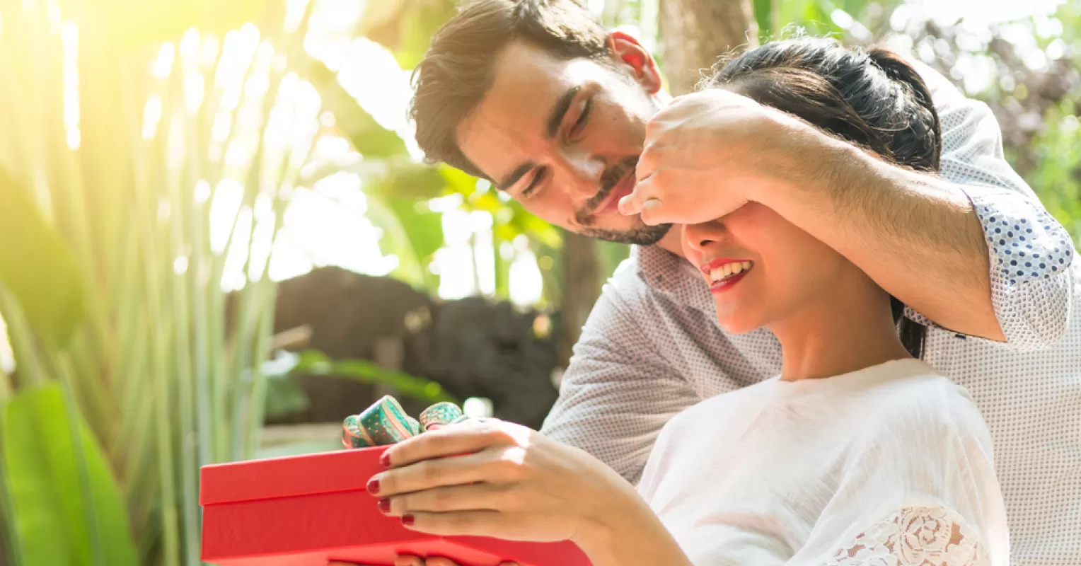 Person appearing overwhelmed while receiving affection from their partner too soon