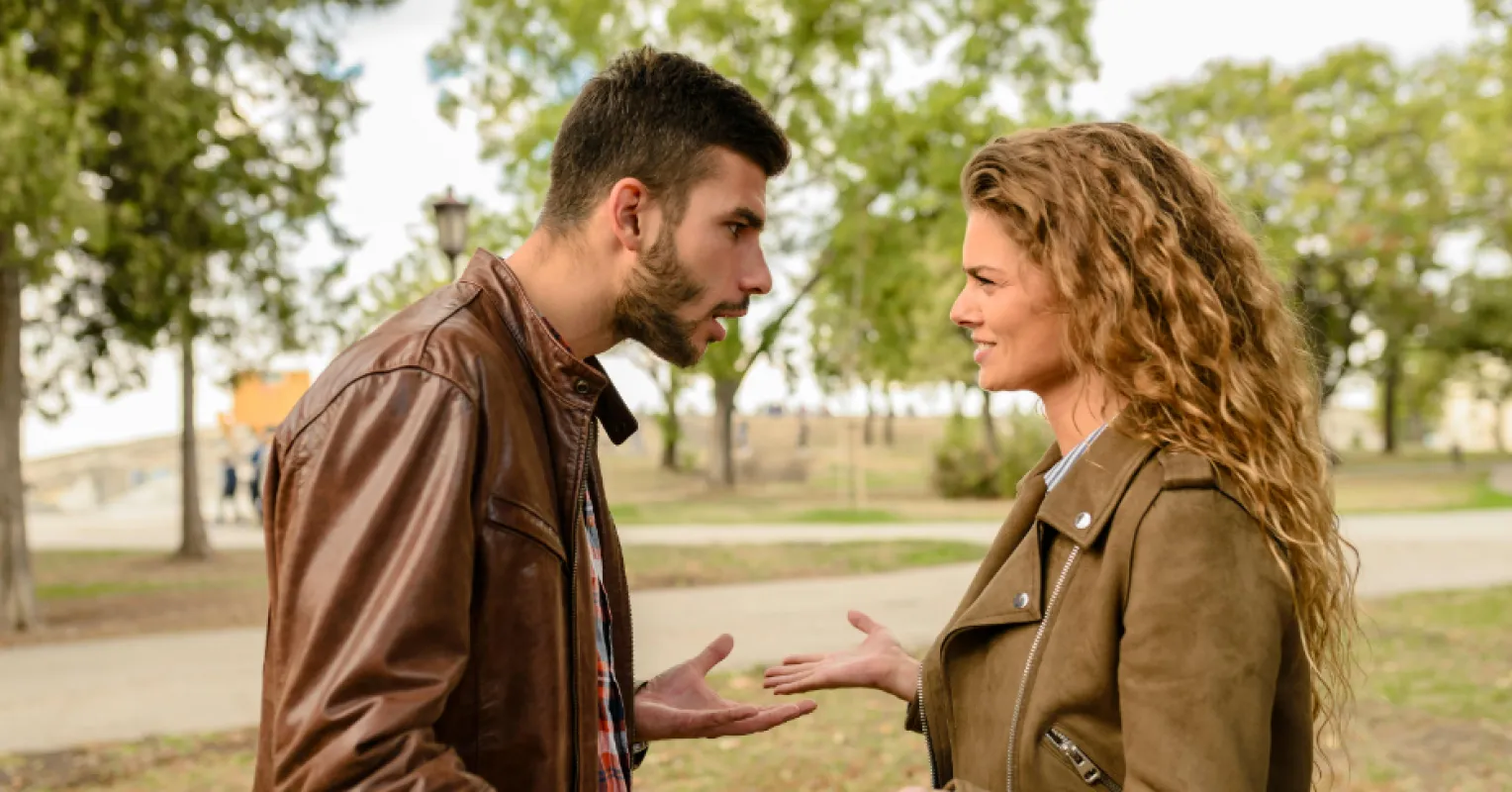 Individual feeling overwhelmed during an important yet tough conversation with a partner