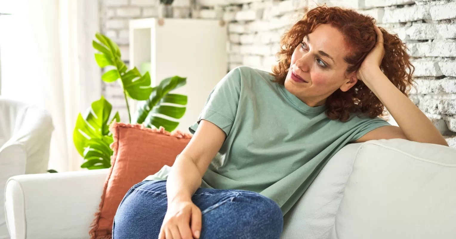 Person reflecting on uncertainty in a relationship connected to i feel pressure to find a partner when i