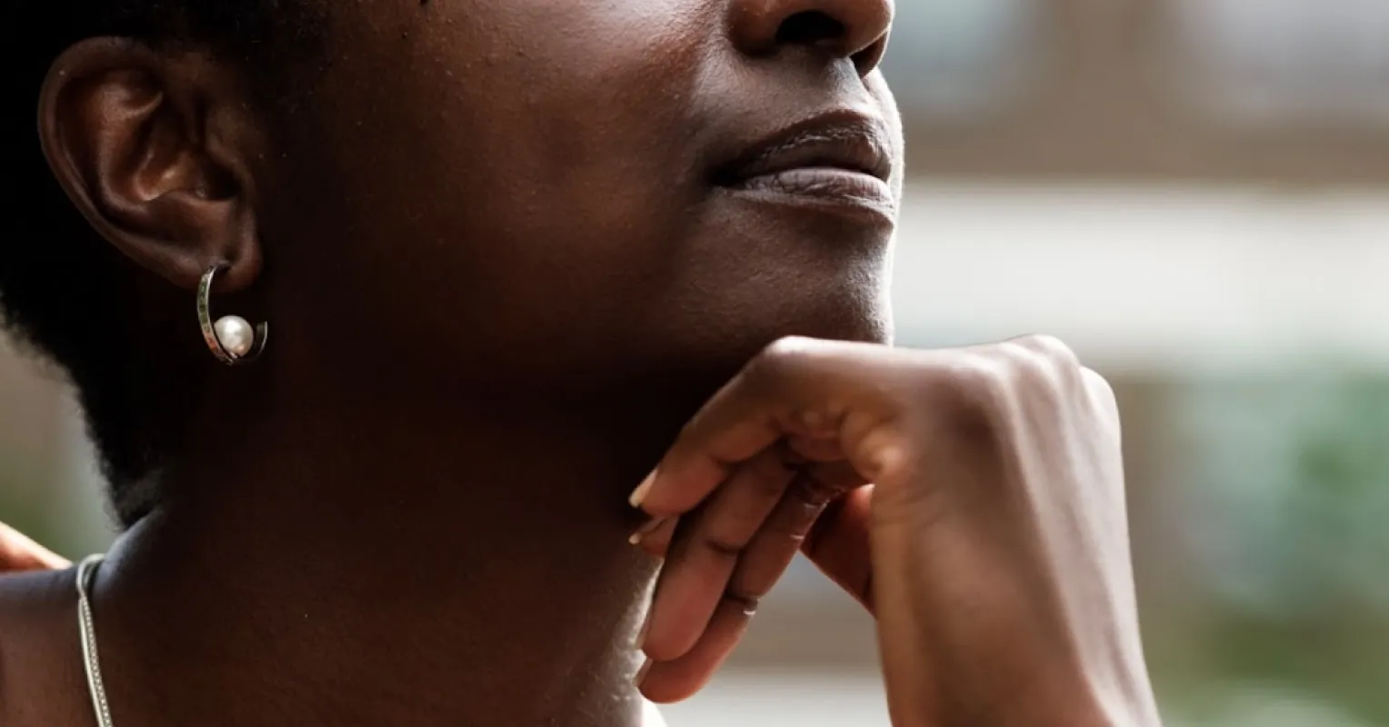 Individual struggling to express feelings during a conversation about relationship signals