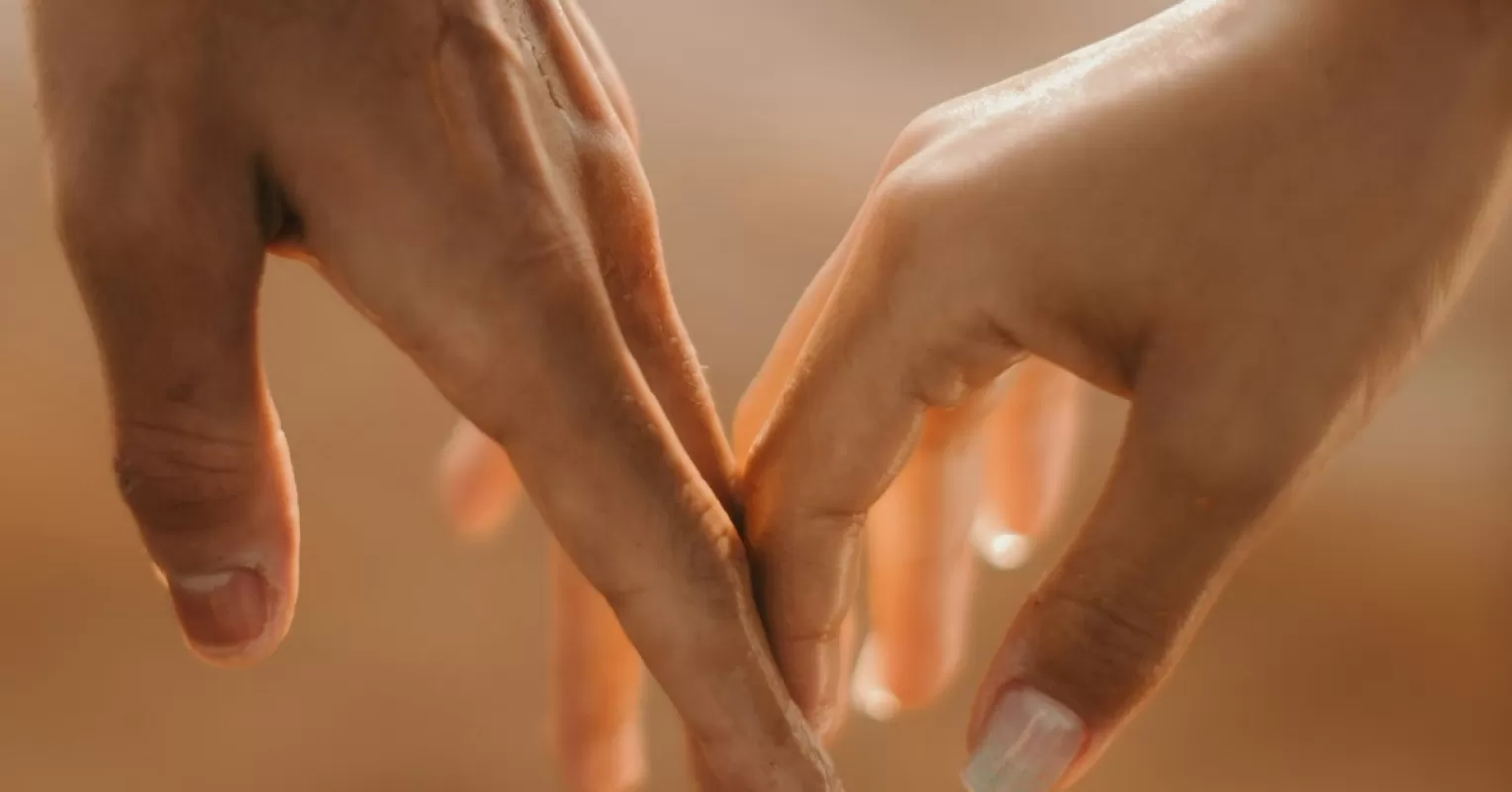 Individual seeking affection and validation from a partner, revealing emotional signals in relationships