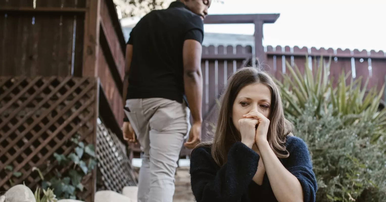 A person lost in thought, contemplating lingering feelings about their ex-partner