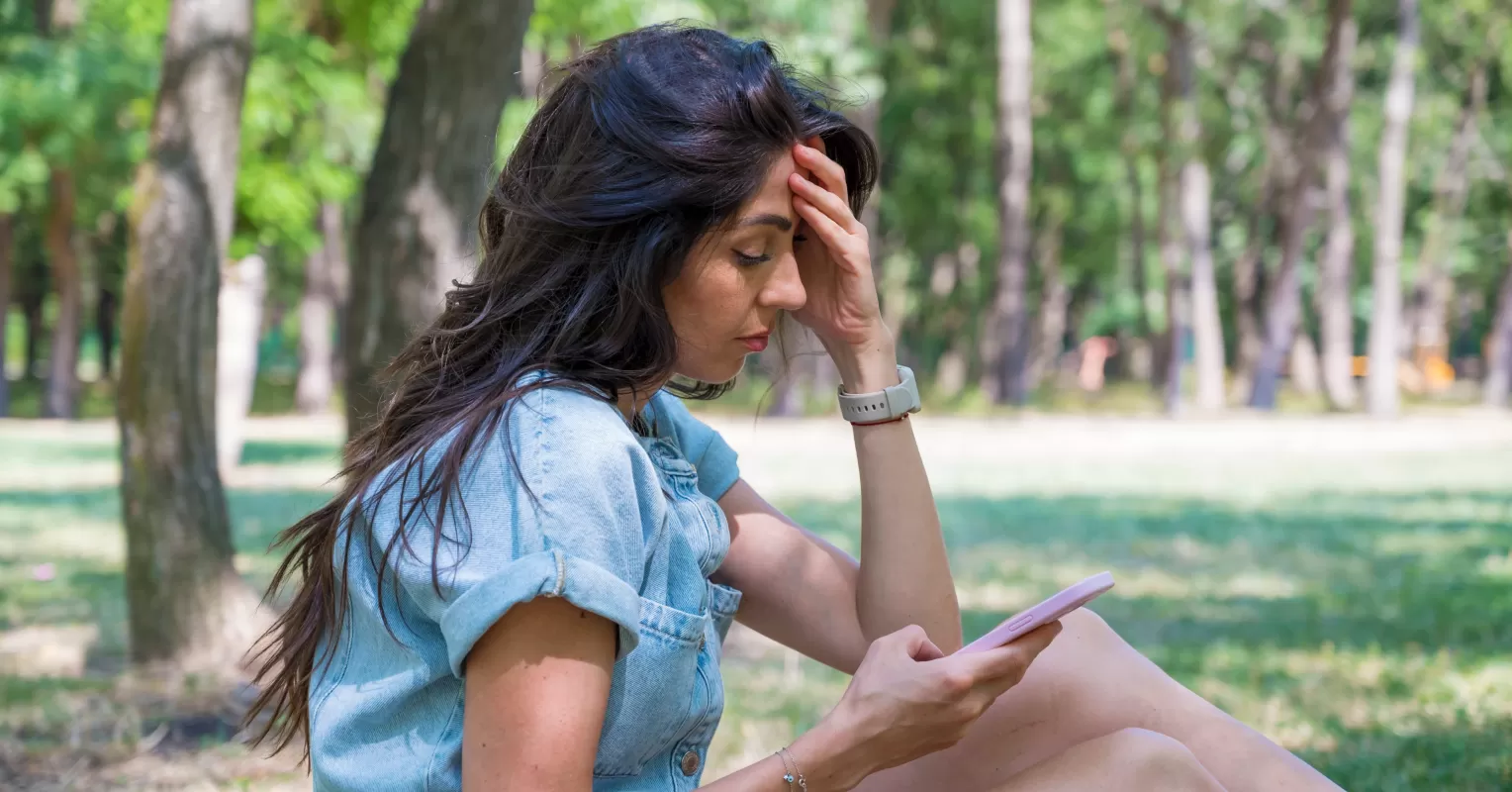 Person contemplating emotional attachment to an emotionally abusive partner in a quiet setting