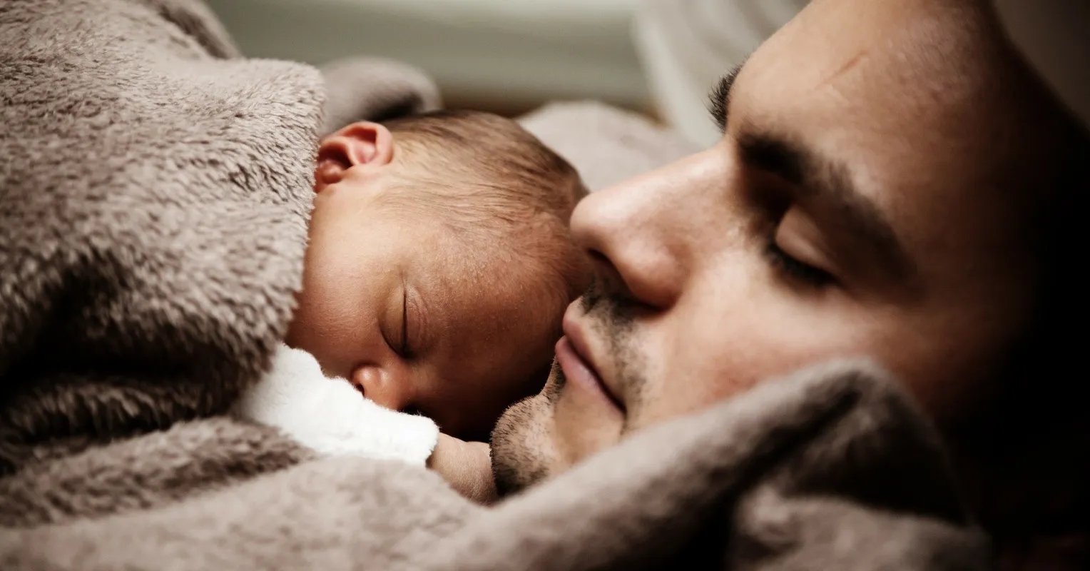 A man experiencing unexpected emotional responses during a partner's pregnancy journey.