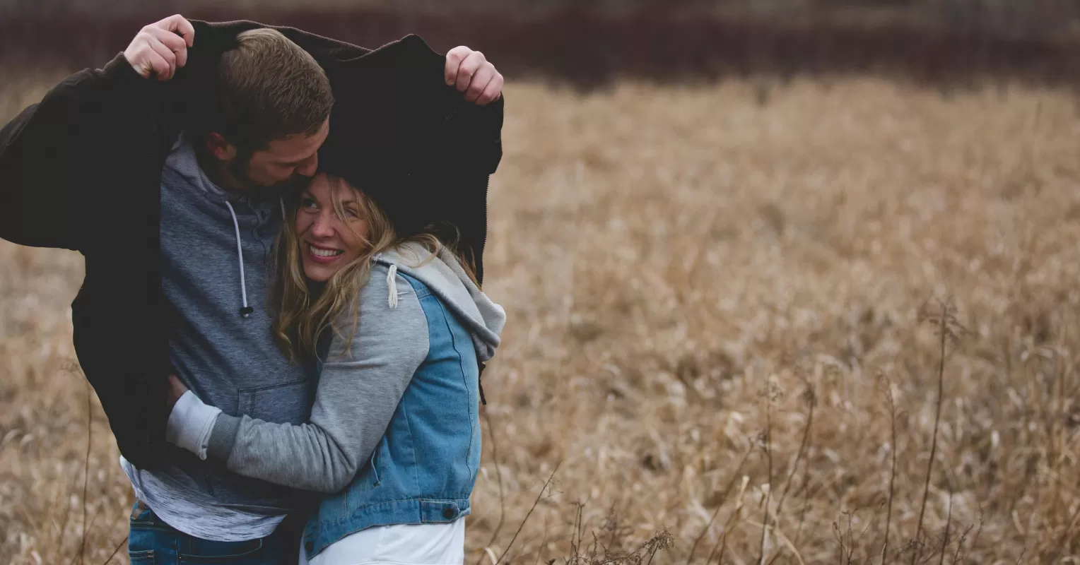 Man expressing affection, illustrating why men often express love first in relationships.