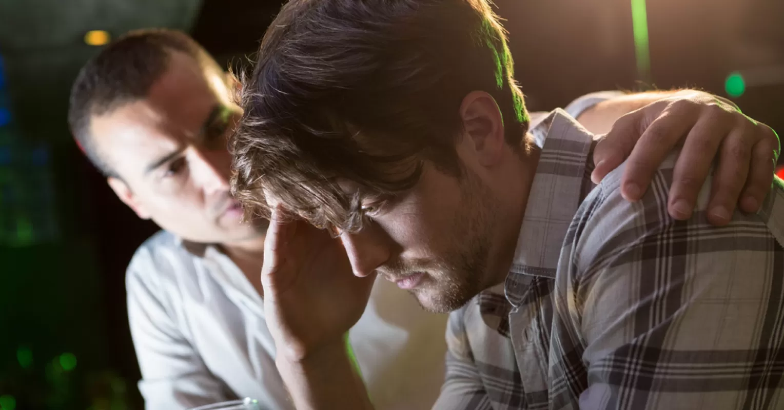 Friend failing to offer emotional support after a breakup, reflecting relationship signals.