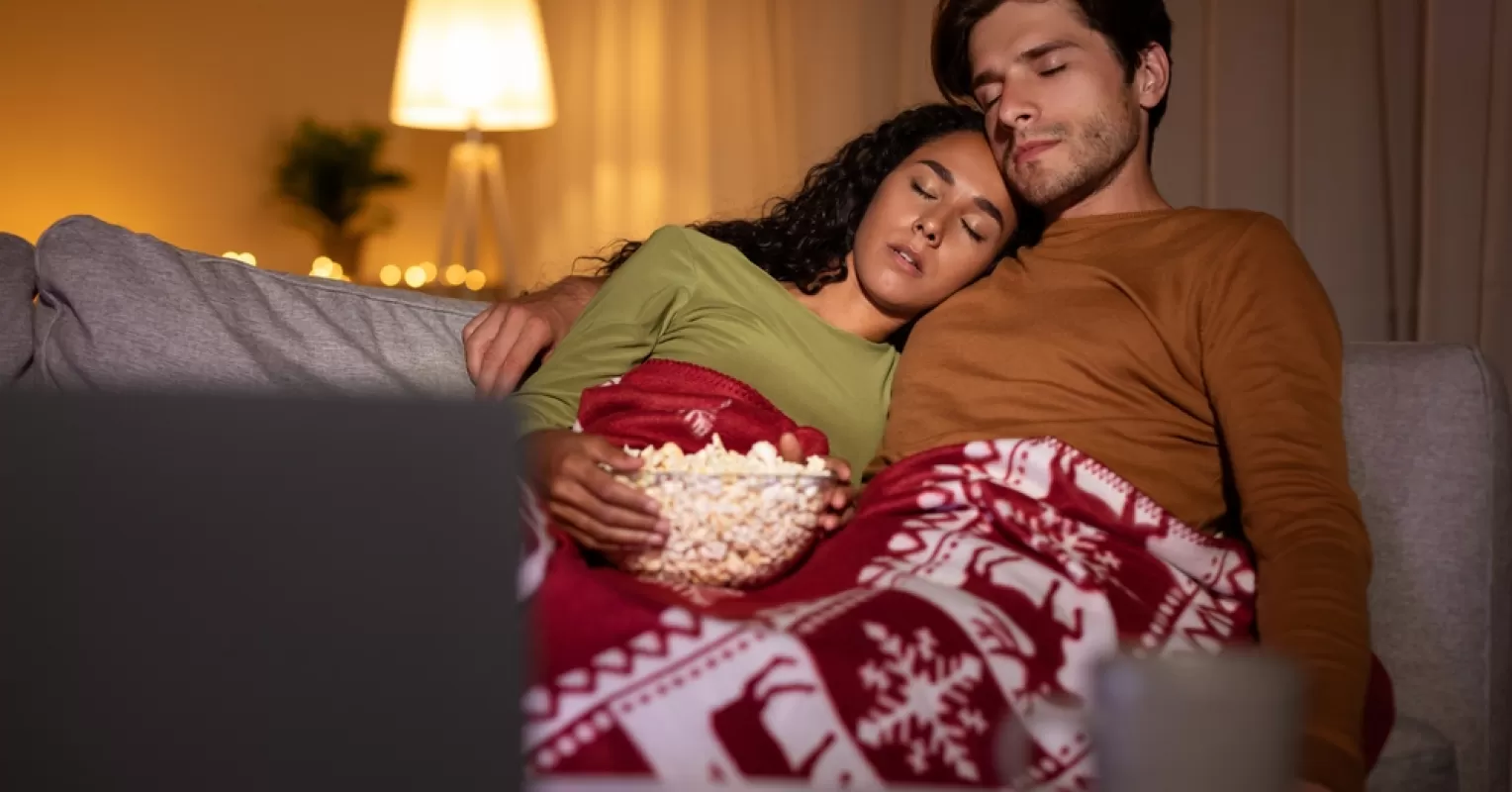 Couple sharing warm moments during winter, capturing the intensity of seasonal relationships