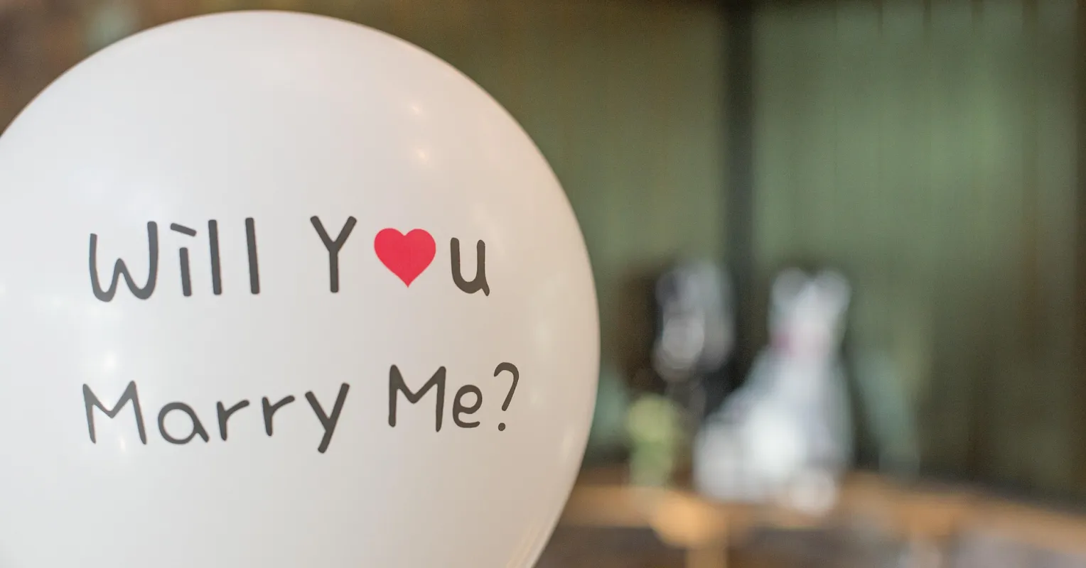 Woman contemplating social pressures behind accepting a marriage proposal she doesn't want