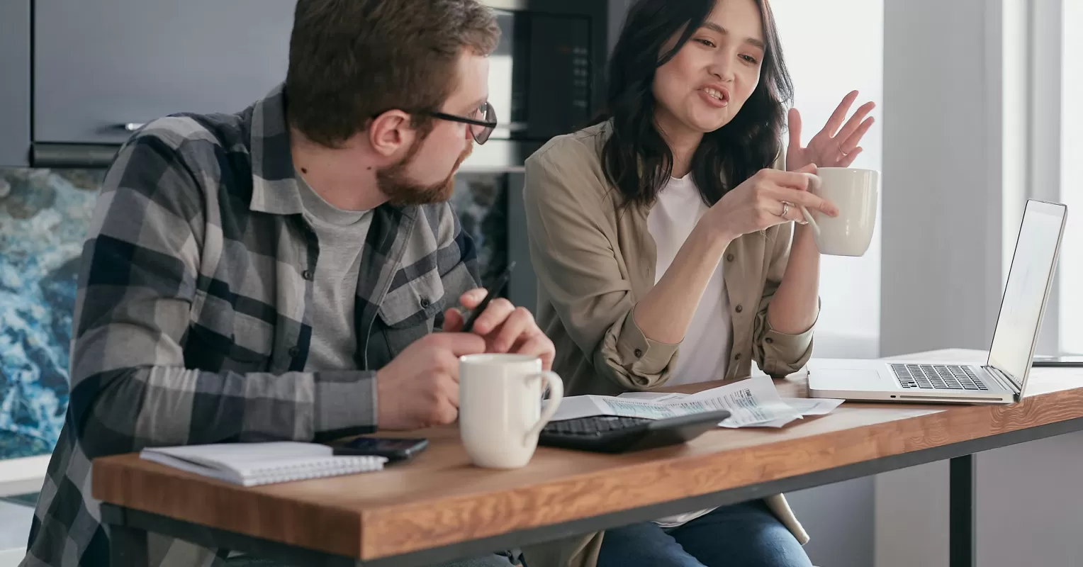 Couple engaging in a heartfelt discussion that brings them closer after a disagreement