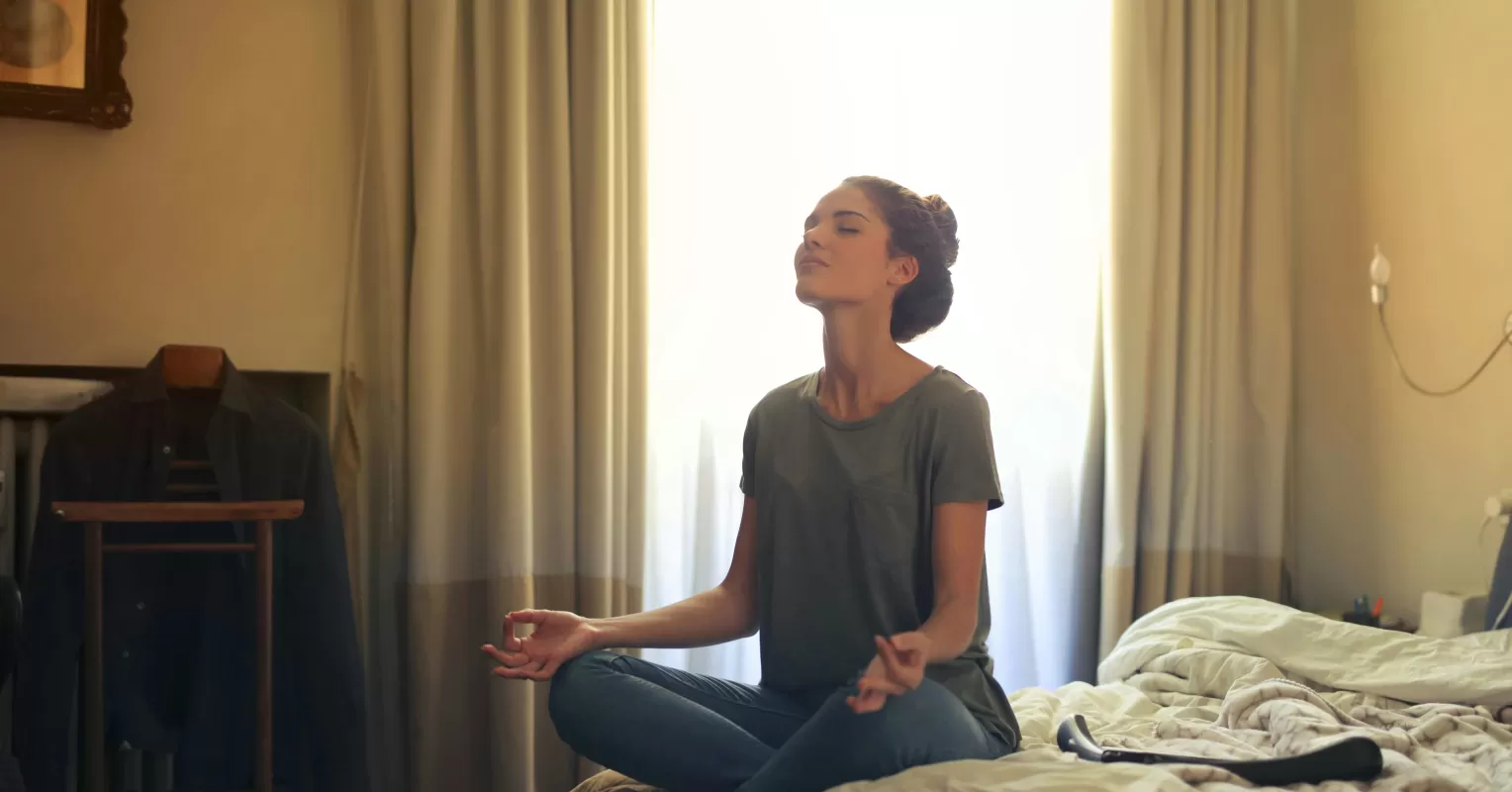 Couple sitting apart, reflecting on unresolved feelings post-conflict resolution attempt