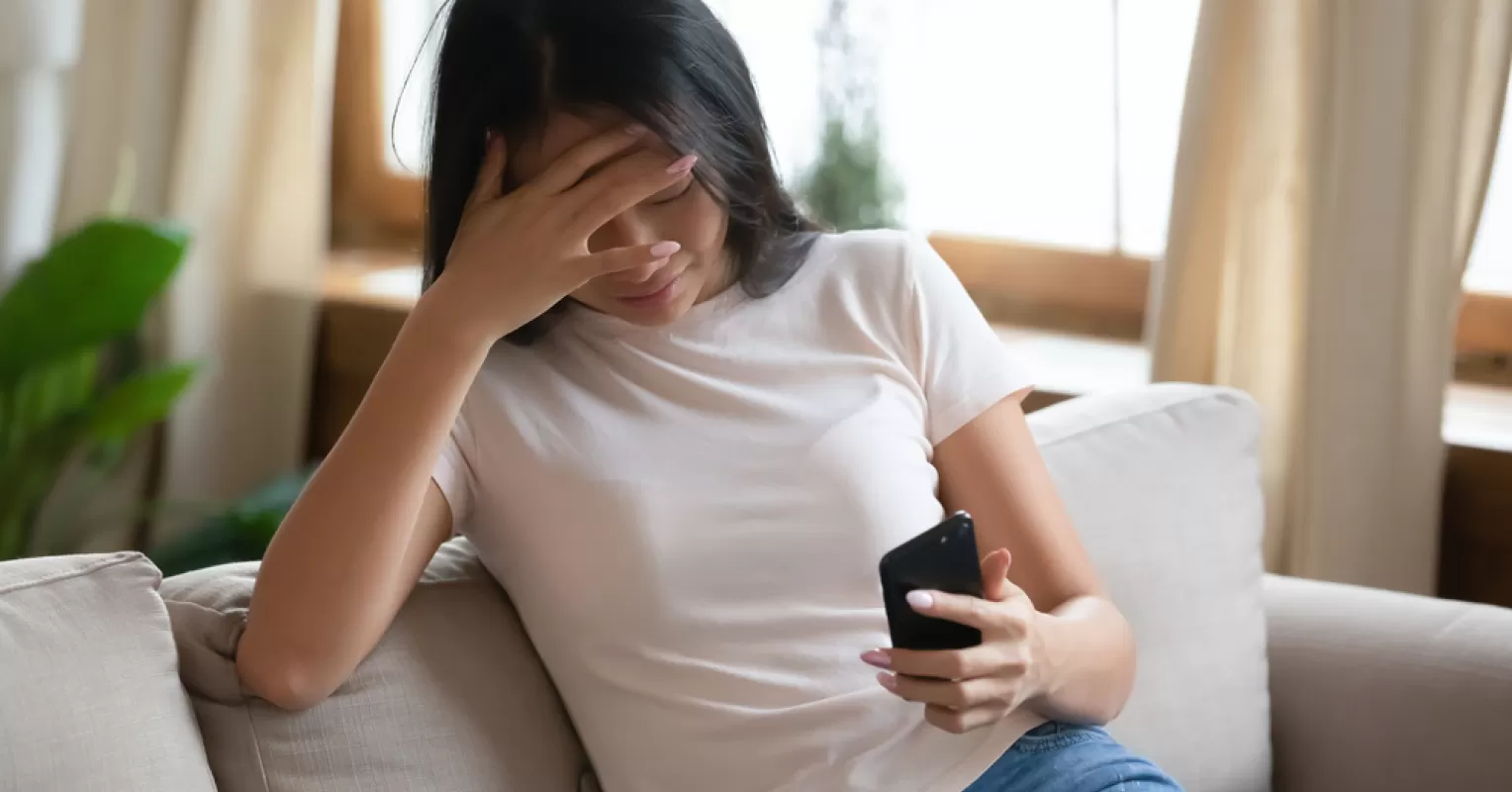 Couple discussing feelings of insecurity over partner's interactions with attractive individuals online