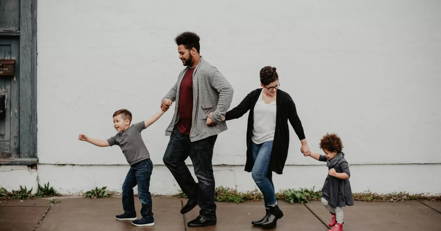 Step-parents and biological parents navigating emotional tension during a family discussion