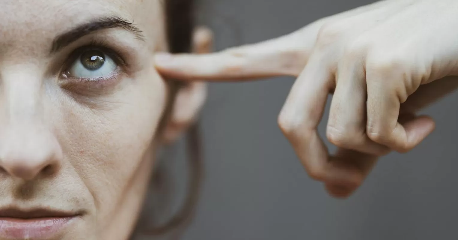 Person reflecting on uncertainty in a relationship connected to why do some people struggle to understand their partners