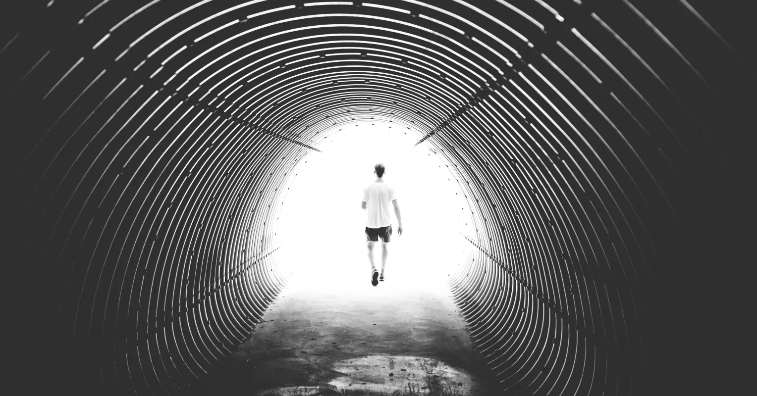 Individual experiencing intense emotions during separation, reflecting on relationship signals