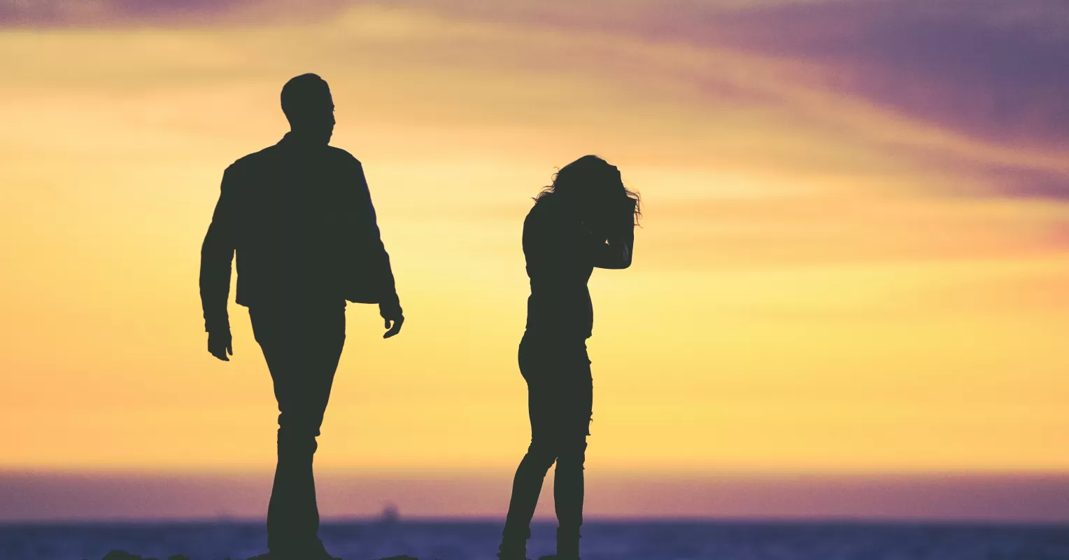 A woman grappling with feelings of distrust in her partner after betrayal