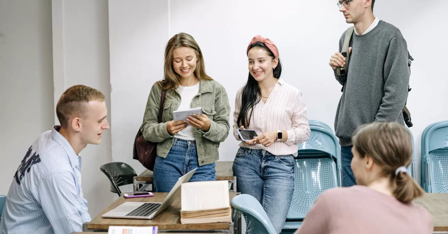 Individual contemplating past school experiences and their impact on present relationship signals.