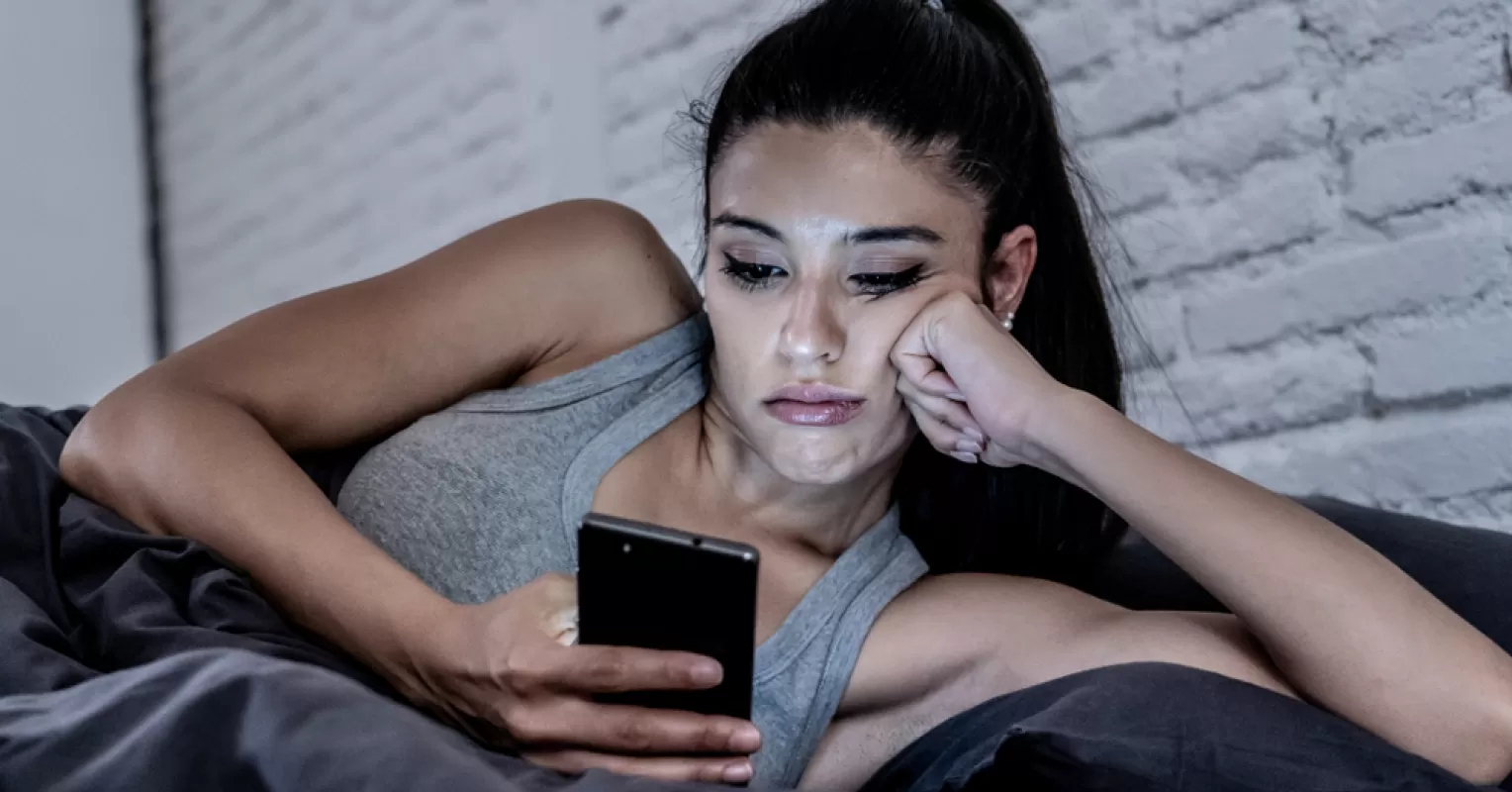 Individual contemplating feelings of abandonment after being ghosted in a relationship