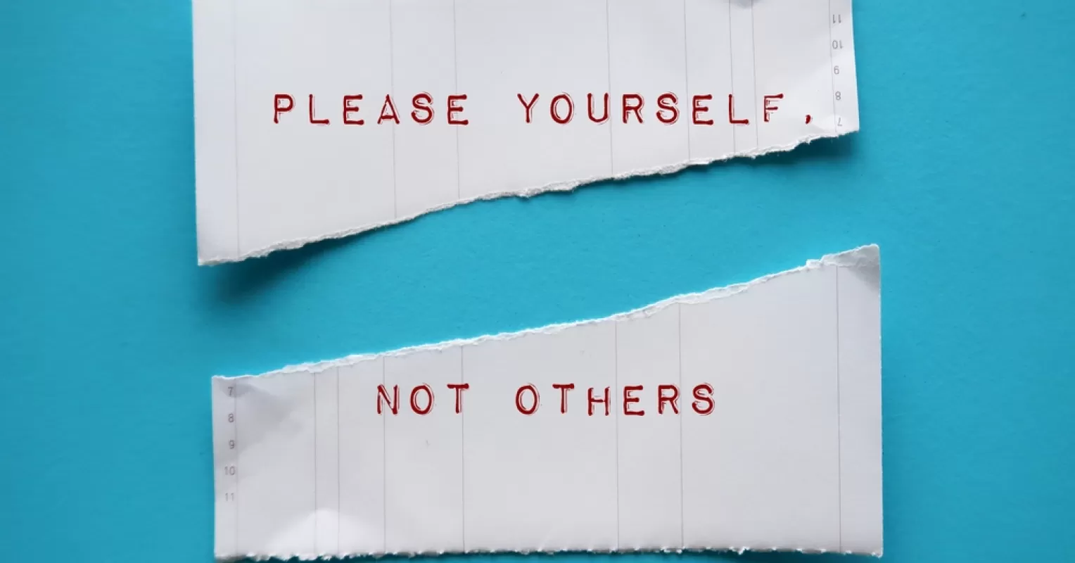 Individual reflecting on self-worth while navigating relationship signals and external validation