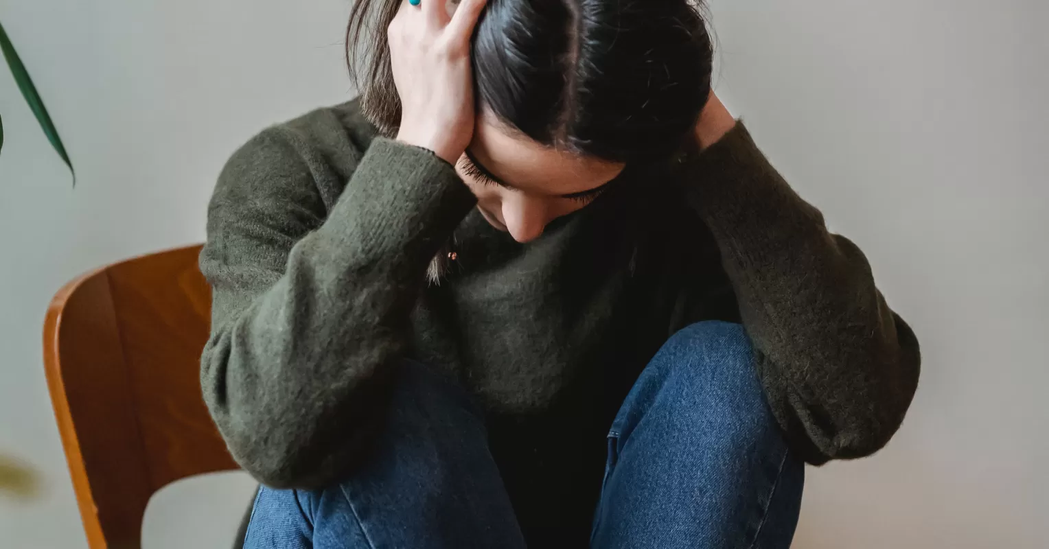A friend comforting another during a difficult moment, highlighting support in tough times