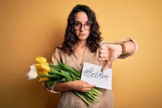 Adult child reflecting on emotional challenges from a narcissistic mother’s behavior