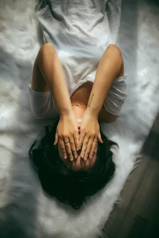 Individual feeling drained while interacting with an energy vampire in a social setting