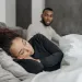 Two friends sharing a laugh while discussing the pros and cons of friends with benefits relationships