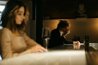 Individual contemplating behaviors associated with fear of commitment in relationships