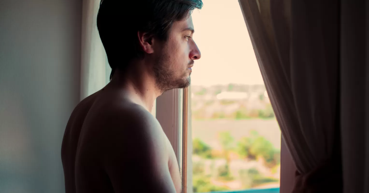Person reflecting on emotional behavior and meaning connected to what does it mean to feel alienated