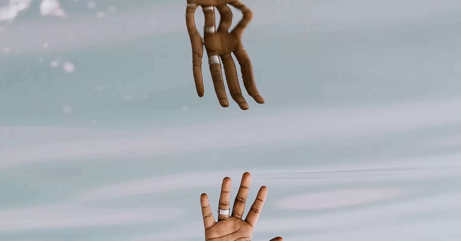 Person reflecting on emotional behavior and meaning connected to i feel disconnected from my emotions