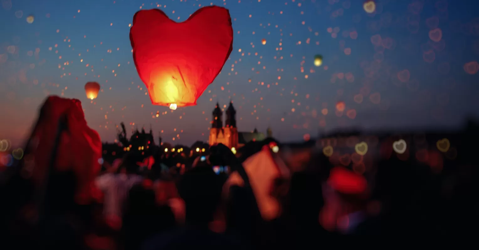 A diverse group of people sharing stories to find peace after losing a loved one