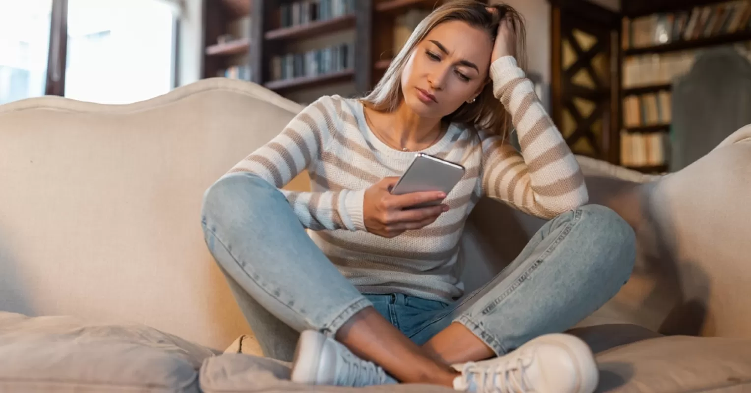 Individual contemplating the emotional impact of ghosting on mental health and relationships