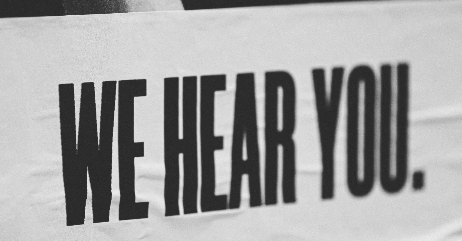 Individual actively engaging in conversation, demonstrating how to become a better listener