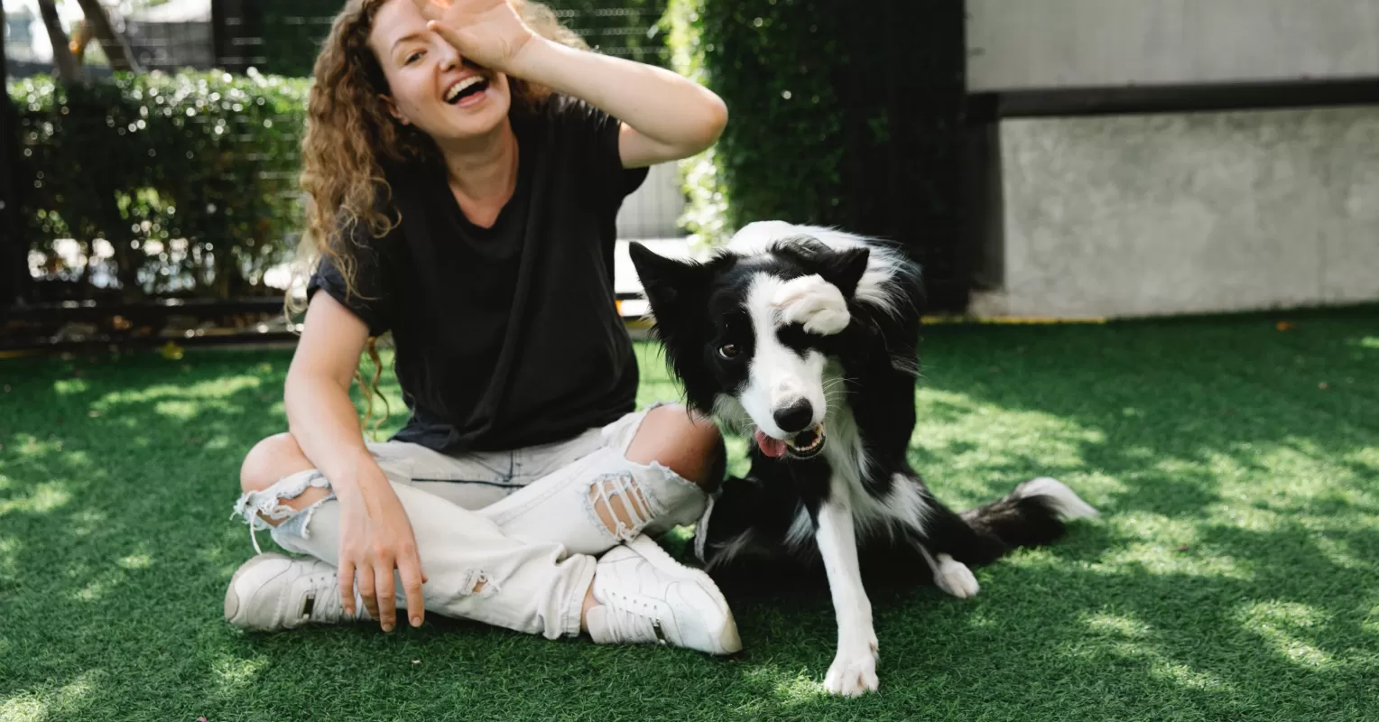 Person sitting alone, reflecting on grief after losing a pet suddenly