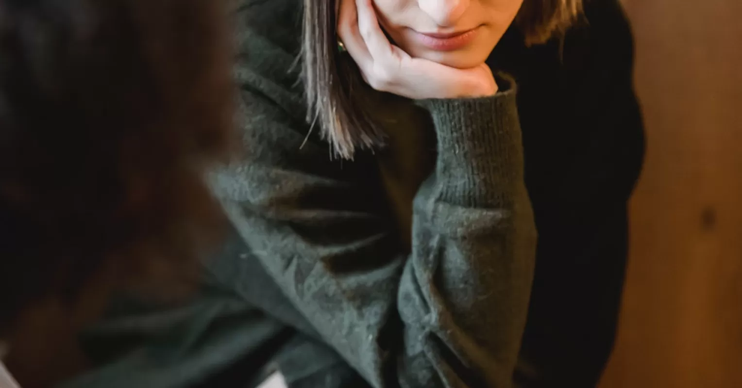 Individual contemplating the impact of a toxic friend on their emotional well-being