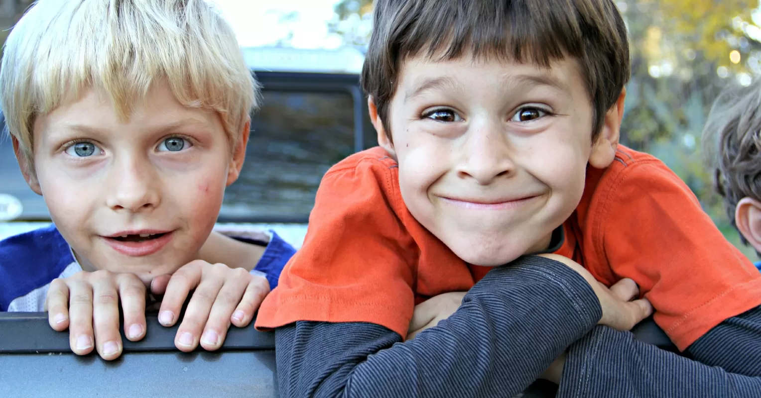 A couple sharing a joyful moment in a cozy café, illustrating how to find joy in everyday life.