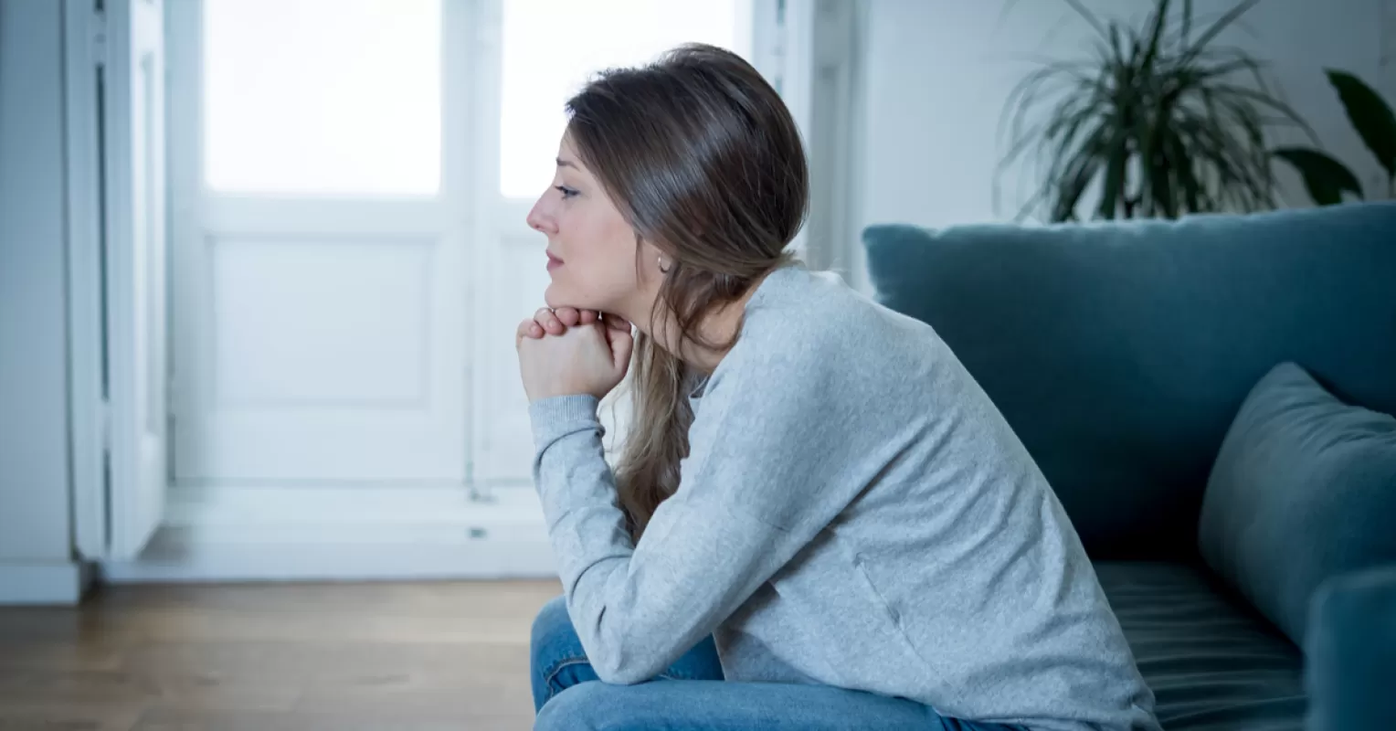 Person reflecting on emotional behavior and meaning connected to how to forgive someone who betrayed you