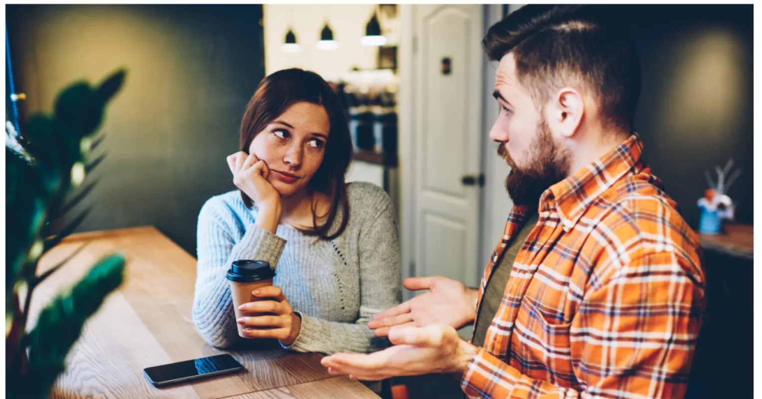 Individual contemplating self-sabotaging behaviors in a relationship setting