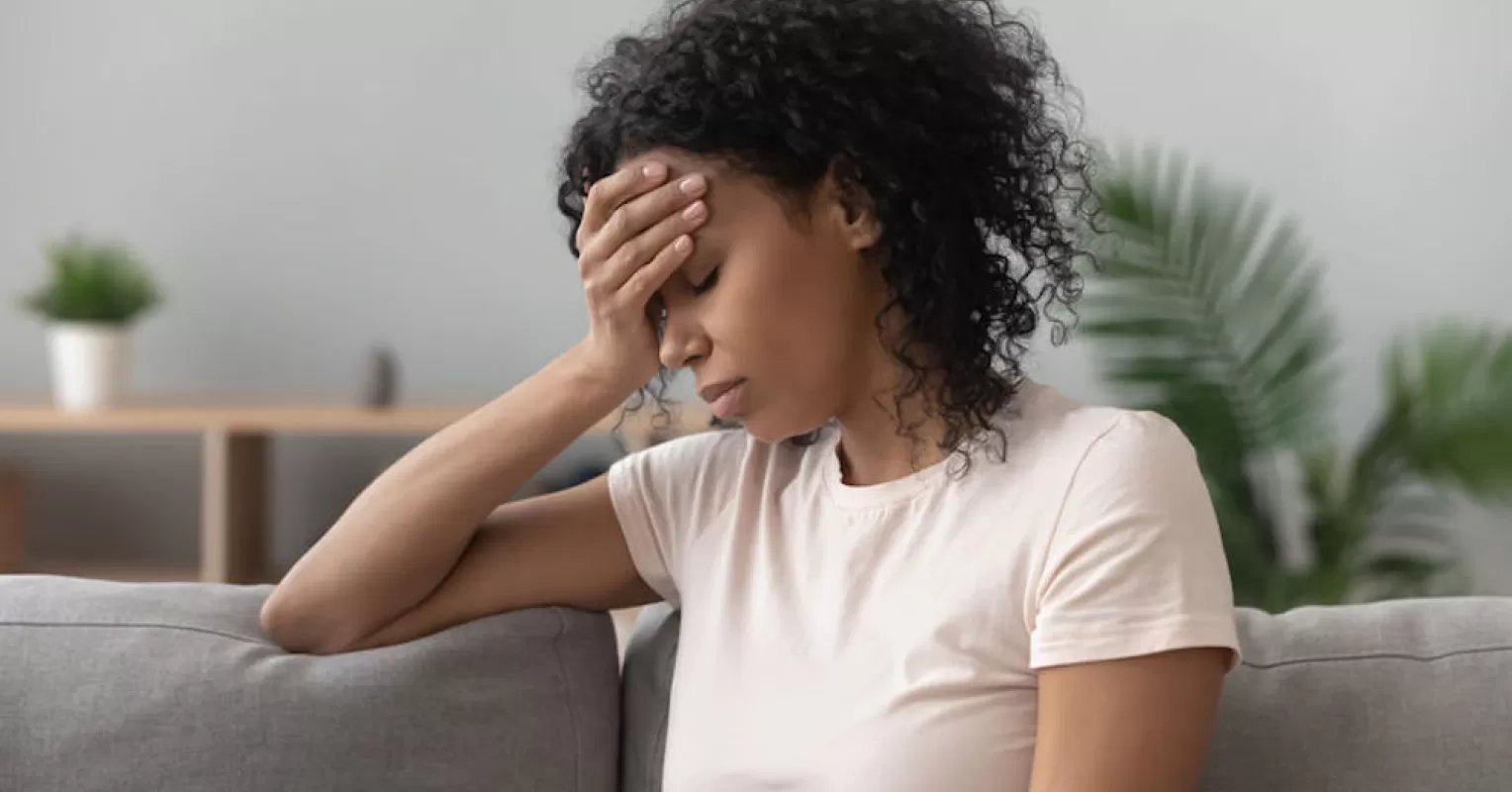 Individual journaling emotions to process grief in a healthy way after loss