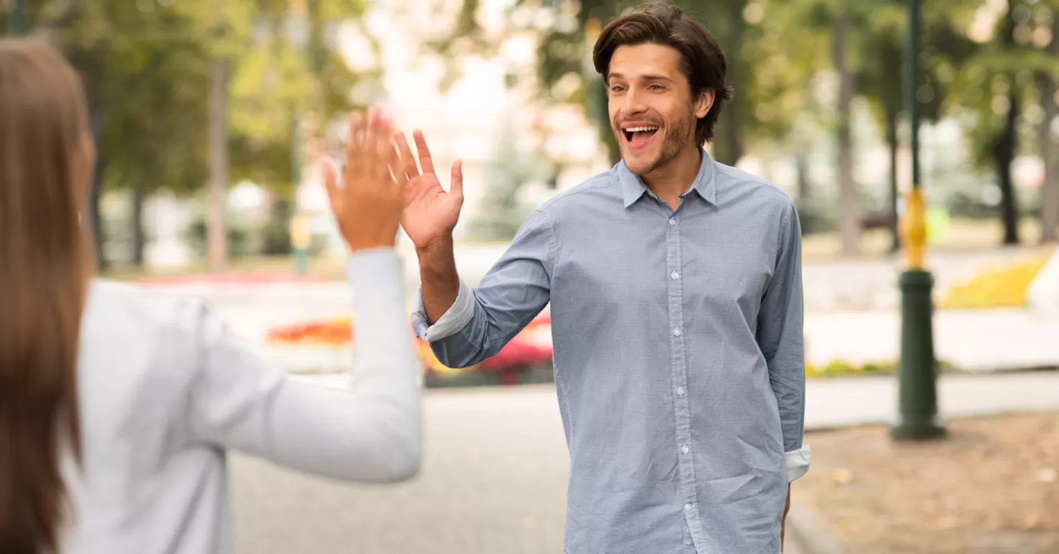 Two friends sharing a warm conversation, exploring how to reconnect after a long time apart