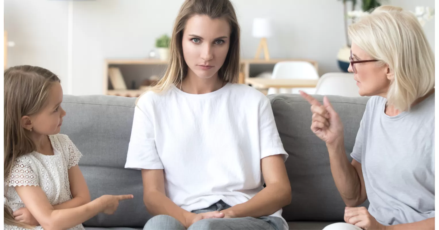 Daughter establishing boundaries while facing emotional manipulation from her mother