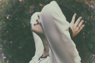 Individual practicing self-love, reflecting on its benefits for healthier relationships