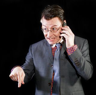 Individual pointing fingers in a discussion, illustrating blame dynamics in social interactions