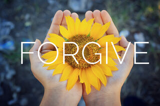 Individual contemplating past hurts while seeking emotional healing and personal growth