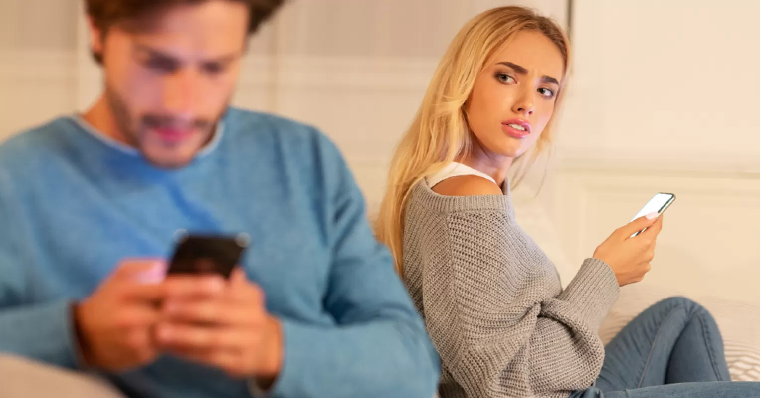 Couple discussing boundaries and emotional signals in a relationship to define cheating